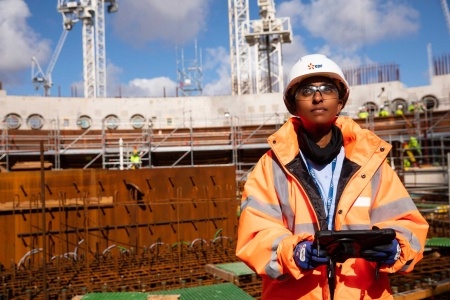 female engineer building nuclear powerplant