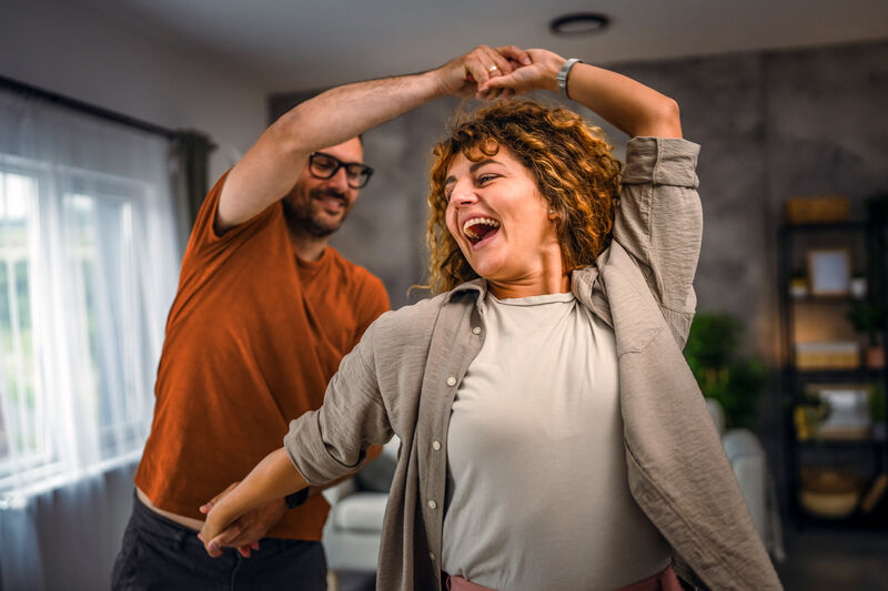 Couple dancing kitchen