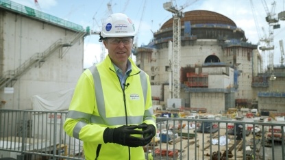 HPC's Simon Parsons in front the Unit 1 reactor building