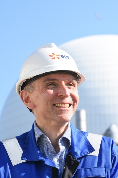 An employee smiling at Sizewell B
