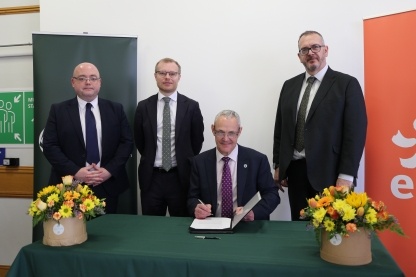 Photo of licence signing ceremony