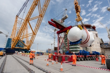 Using Big Carl to lift the reactor was an innovation for Unit 2, saving space, time and money.