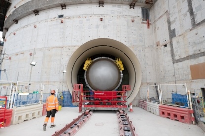 The reactor is transfered on rails into the second reactor building.