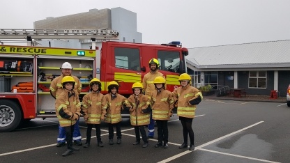 Pupils from Berwick Middle School with members of the Torness fire crew during Christmas Cracker Week