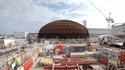 The 245-tonne steel dome will be lifted onto the top of the first reactor building this year.