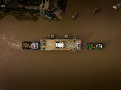 The reactor arrives by barge to Combwich Wharf on the River Parrett in Somerset.