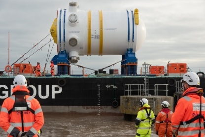 The reactor, pictured here arriving by barge to Combwich Wharf, will help Britain Achieve Net Zero.
