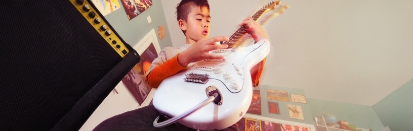 Boy playing guitar