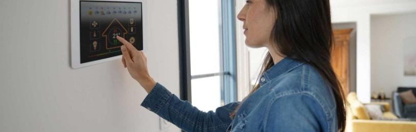 Woman using a smart thermometer 