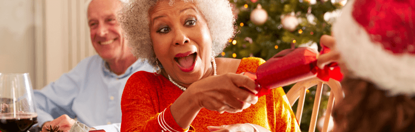 Lady pulling christmas cracker