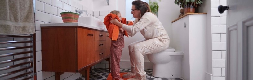 Mother and daughter in bathroom 