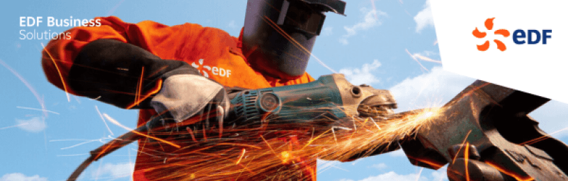 Branded photograph of person in orange using an angle grinder with sparks flying