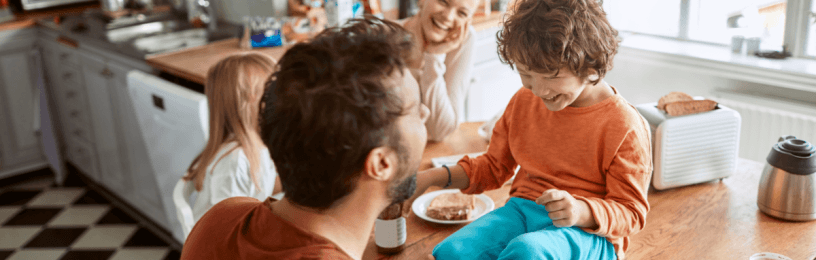 A family enjoying breakfast in a kitchen