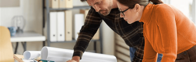 Two people working on a project together