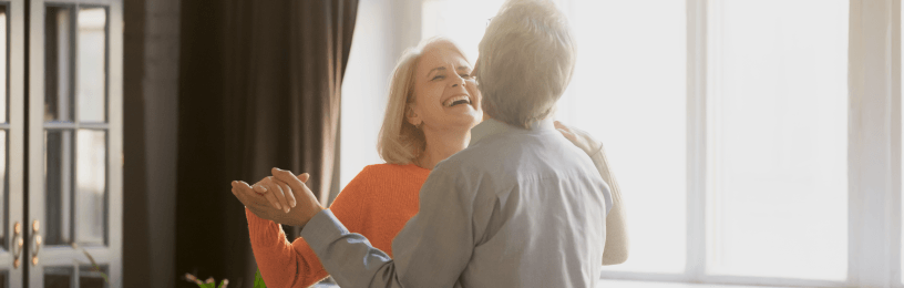 Couple dancing in the living room