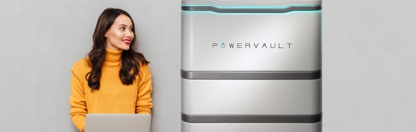 Lady with laptop next to Powervault