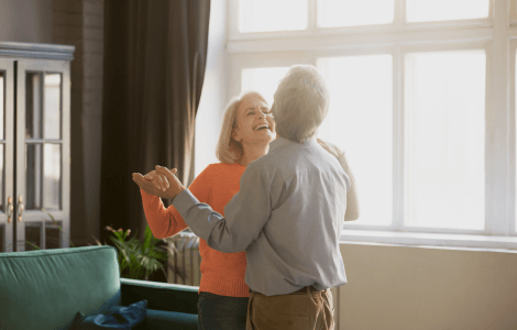 Couple dancing in the living room