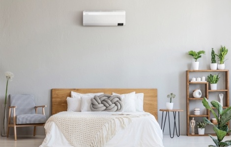 Room showing air conditioning unit on wall