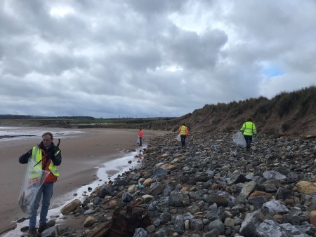 Torness workers beach cleaning