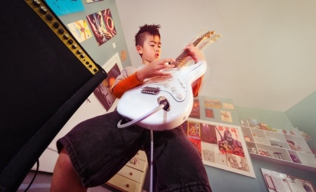 Boy playing guitar