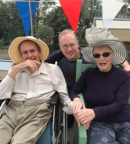 Employee Mark with his parents