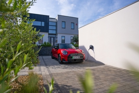 Electric mini charging in a driveway