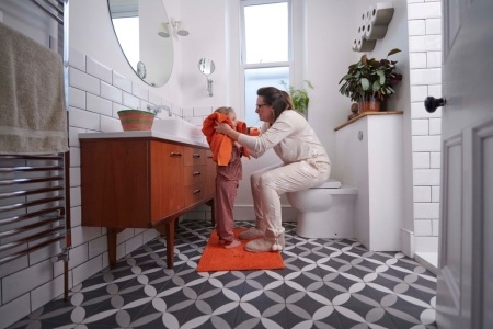 Mother and daughter in bathroom 