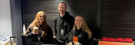 EDF small business reps standing by EDF display at Expo