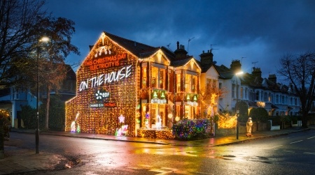 House fully lit up with Christmas lights