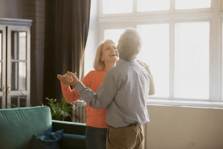 Couple dancing in the living room