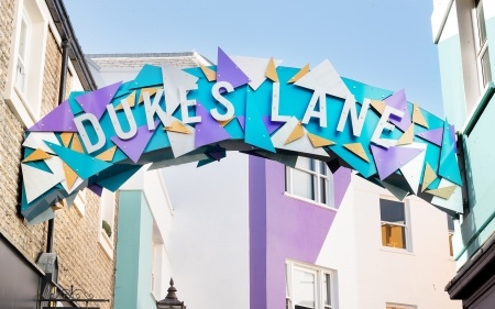Dukes Lane blue sign and blue sky 