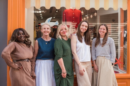 Shop owners, Enterprise Nation and EDF in front of orange pop up