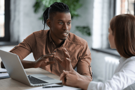 Businessman and woman negotiating