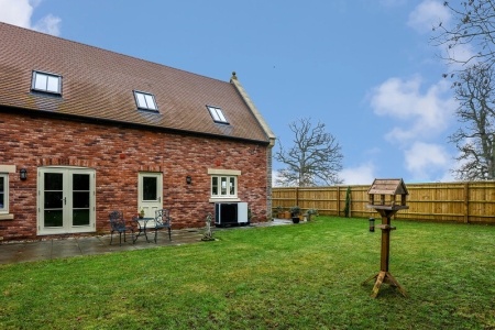 Air source heat pump unit on external wall