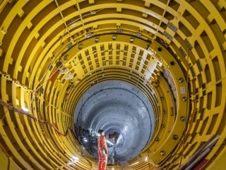 In the tunnels, work is underway to make the breakthrough connection between the miles of tunnels with the intake and outtake cooling water heads.