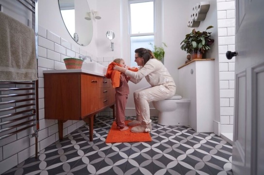 A mother and daughter in the bathroom