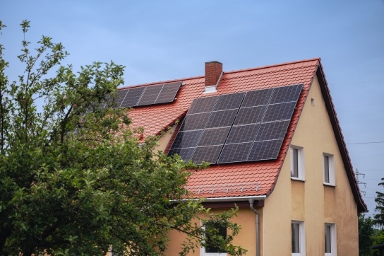Solar panels on the side of a house roof