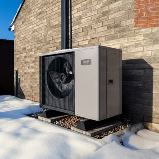 An air source heat pump in the snow 