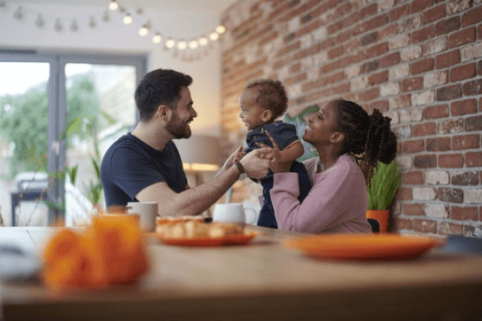 Couple holding a baby