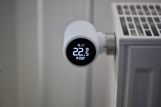 A digital thermostat on a radiator