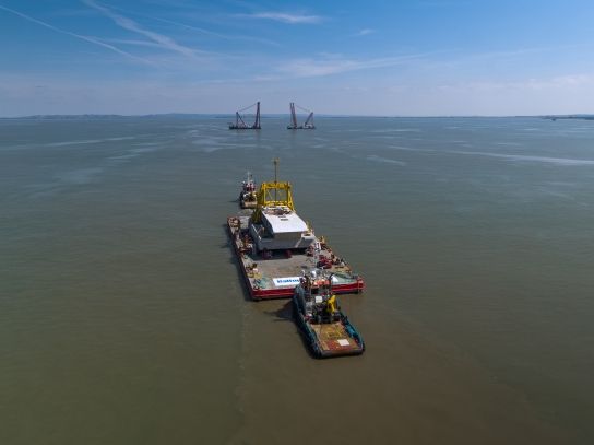 One of Hinkley Point C’s intake heads as it is towed into the Bristol Channel to join “Gulliver” and “Rambiz”. These floating cranes are the size of football pitches and have a combined lifting capacity of 7,300-tonnes.  