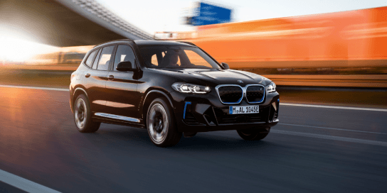 Side view of BMW iX3 in black 