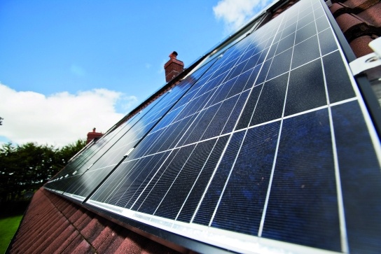 Up close image of solar panels on roof of home