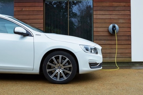 Electric car (EV) plugged into a Pod Point home charger